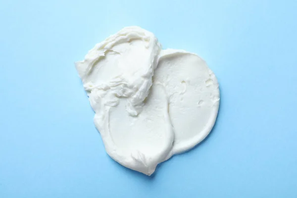 Smear Delicious Cream Cheese Light Blue Background Top View — Stock Photo, Image
