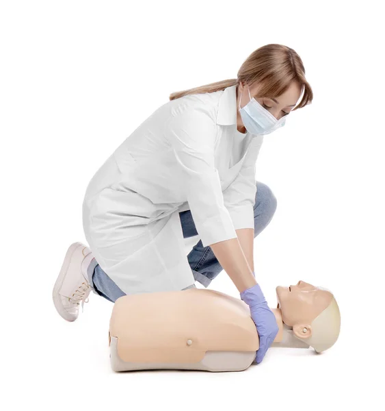 Doctor Uniform Protective Mask Practicing First Aid Mannequin White Background — Stok fotoğraf