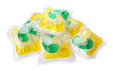 Pile of dishwasher detergent pods on white background