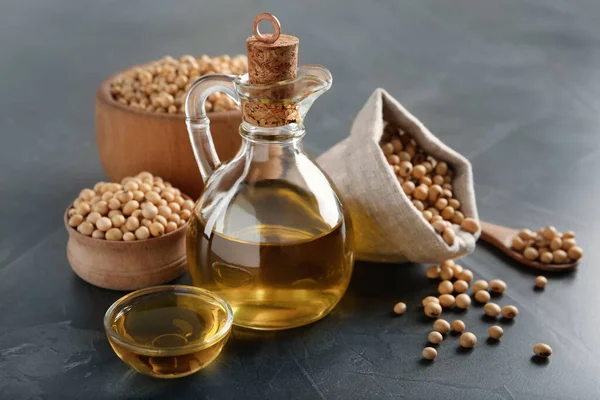 Composición Con Aceite Soja Sobre Mesa Gris —  Fotos de Stock