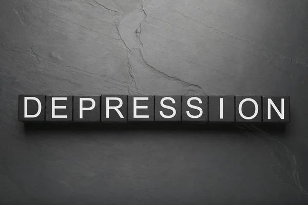 Word Depression Made Black Wooden Cubes Dark Table Flat Lay — Zdjęcie stockowe