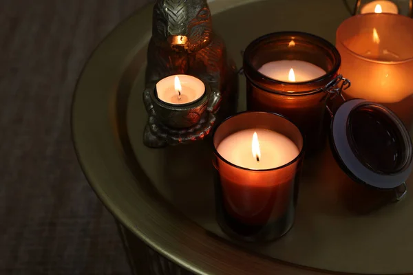 Burning Candles Different Holders Table Indoors — Stockfoto