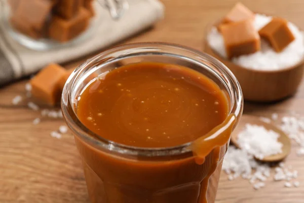 Tasty Salted Caramel Glass Table Closeup — Stockfoto
