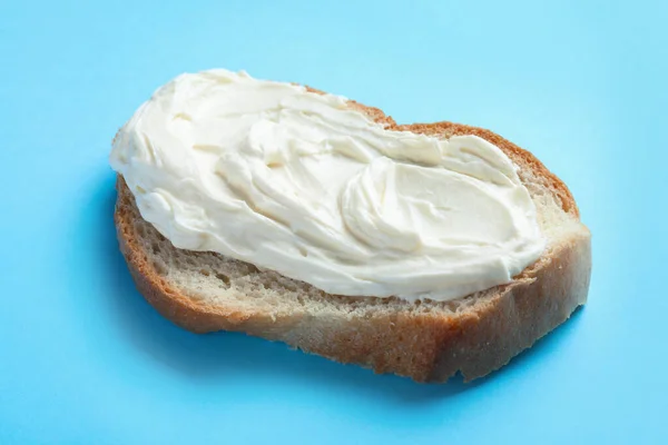 Slice Bread Tasty Cream Cheese Light Blue Background Closeup — Φωτογραφία Αρχείου