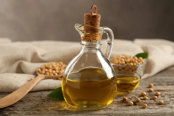 Composición Con Aceite Soja Sobre Mesa Madera —  Fotos de Stock