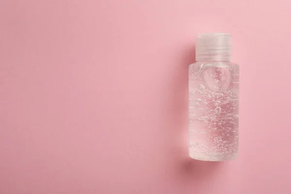 Бутылка Косметического Геля Розовом Фоне Вид Сверху Пространство Текста — стоковое фото