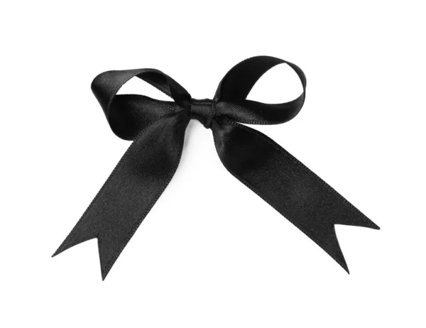 白い背景に弓で結ばれた黒いサテンリボン トップビュー — ストック写真