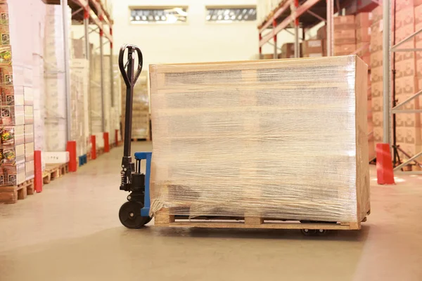 Wooden Pallets Wrapped Stretch Manual Forklift Indoors — Stock Photo, Image