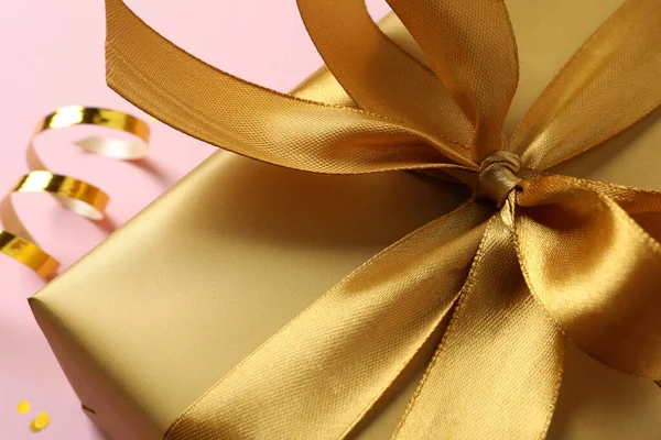Golden Gift Box Bow Pink Background Closeup — Stock Photo, Image