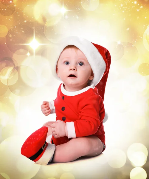Schattige Kleine Baby Santa Claus Kostuum Tegen Wazig Feestelijk Licht — Stockfoto