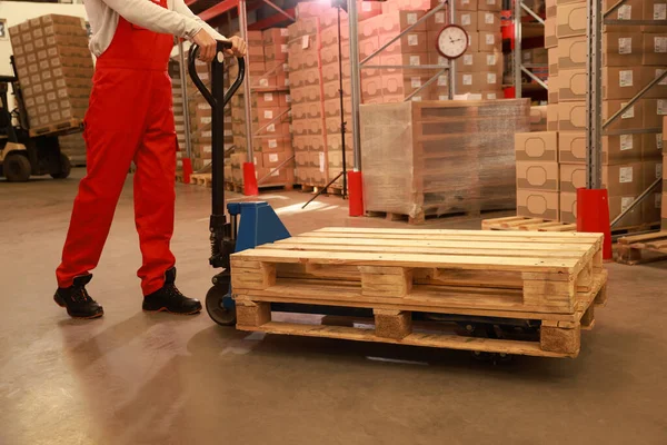Worker Moving Wooden Pallets Manual Forklift Warehouse Closeup — Fotografia de Stock
