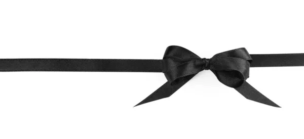 白で隔離された弓とエレガントな黒のリボン トップビュー — ストック写真
