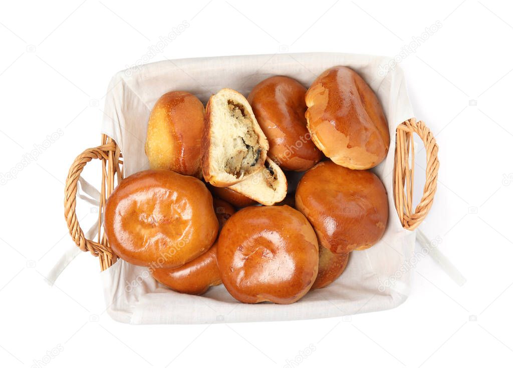 Delicious baked mushrooms and onion pirozhki on white background, top view