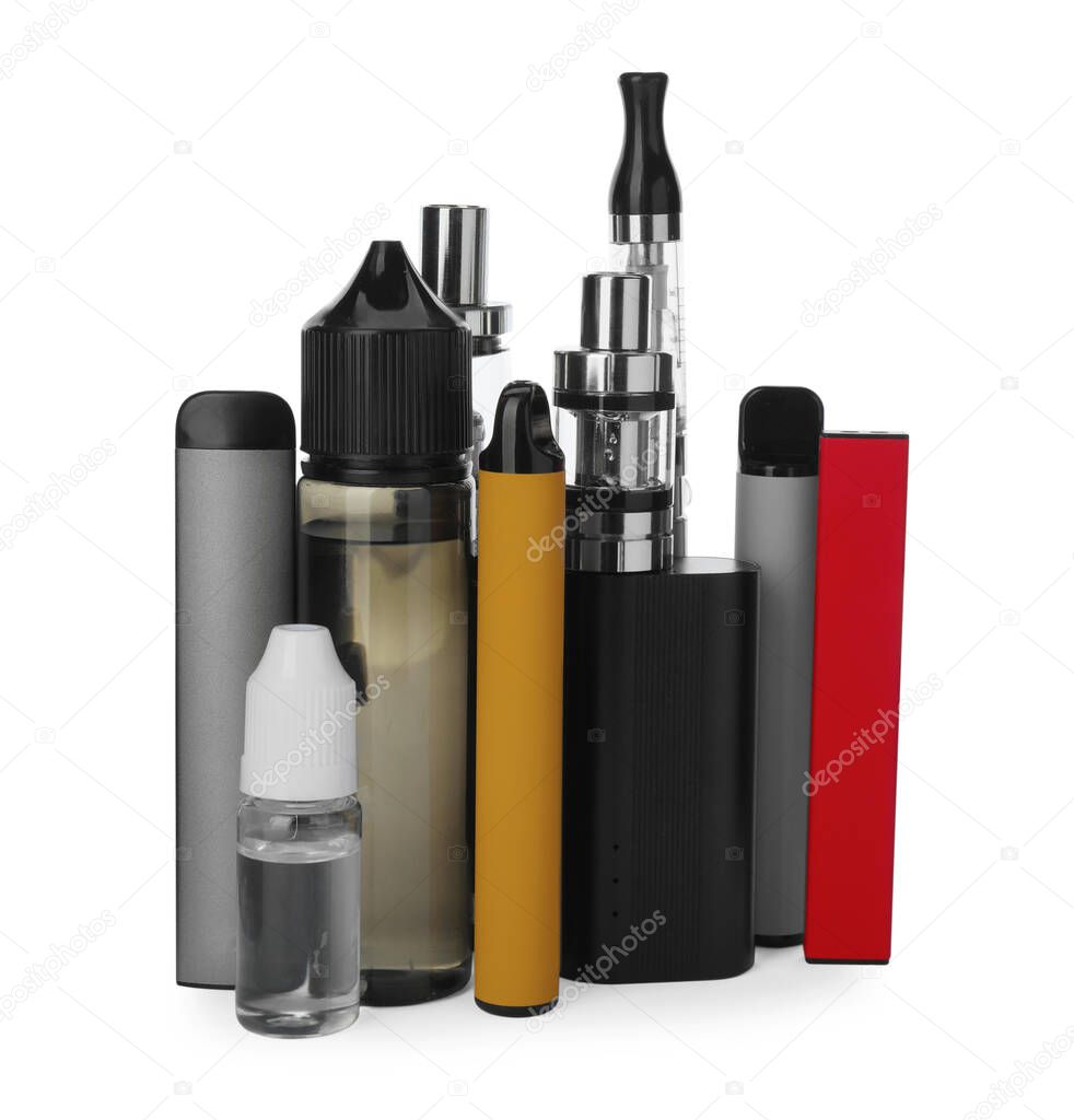 Many electronic smoking devices and liquid solutions on white background