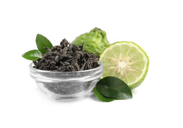 Trockene Bergamotte Teeblätter Glasschale Und Frische Früchte Auf Weißem Hintergrund — Stockfoto