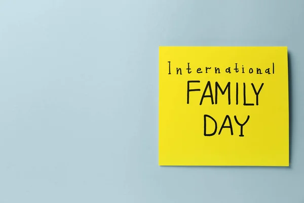 Karte Mit Den Worten Internationaler Familientag Auf Grauem Hintergrund Ansicht — Stockfoto