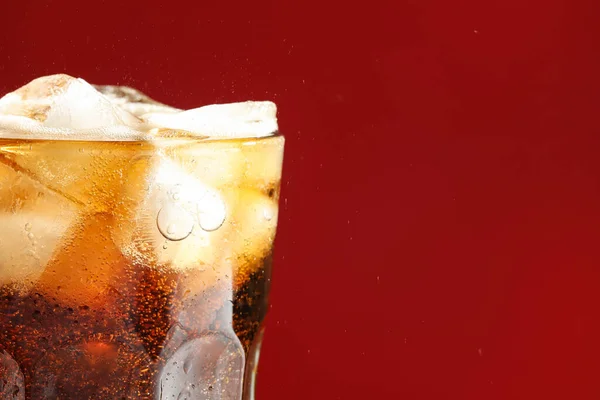 Glass Refreshing Soda Drink Ice Cubes Red Background Closeup Space — Stock Photo, Image