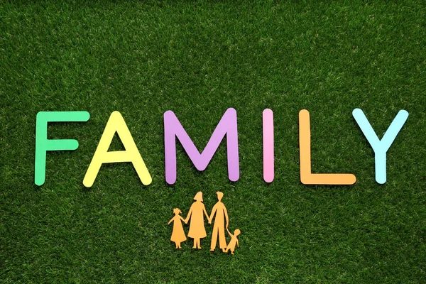 Paper Cutout Word Family Made Colorful Letters Green Grass Flat — Stock Photo, Image