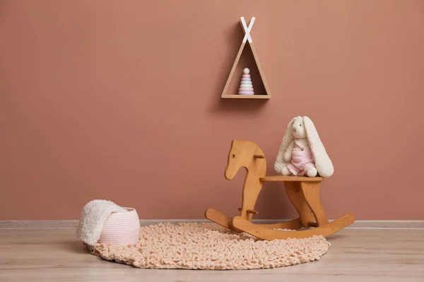 Rocking Horse Bunny Toy Wicker Basket Wigwam Shaped Shelf Pink — Stock Photo, Image