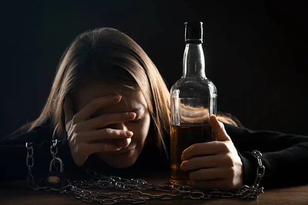 Alcohol Addiction Woman Chained Bottle Whiskey Wooden Table Black Background — Stock Photo, Image