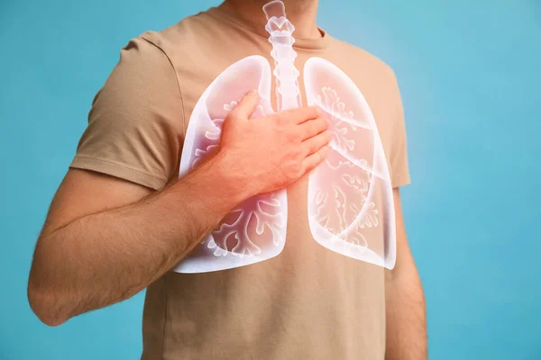 Man Holding Hand Chest Illustration Lungs Turquoise Background Closeup — Stock Photo, Image