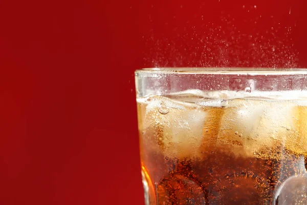 Glass Refreshing Soda Drink Ice Cubes Red Background Closeup Space — Stock Photo, Image