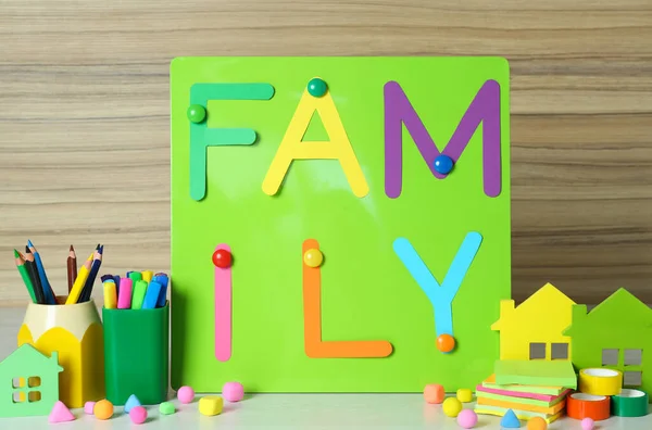 Magnetic Board Text Family Surrounded Different Stationery White Table — Stock Photo, Image