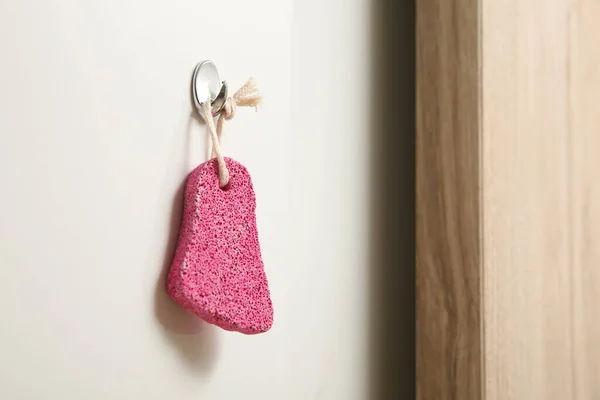 Pink Pumice Stone Hanging White Wall Space Text — Stock Photo, Image