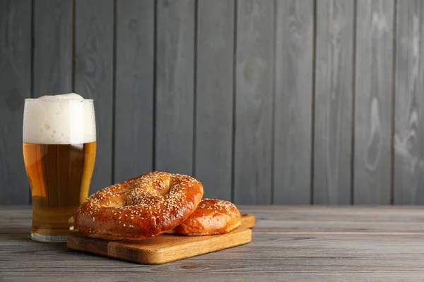 Tasty Pretzels Glass Beer Wooden Table Space Text — Stock Photo, Image