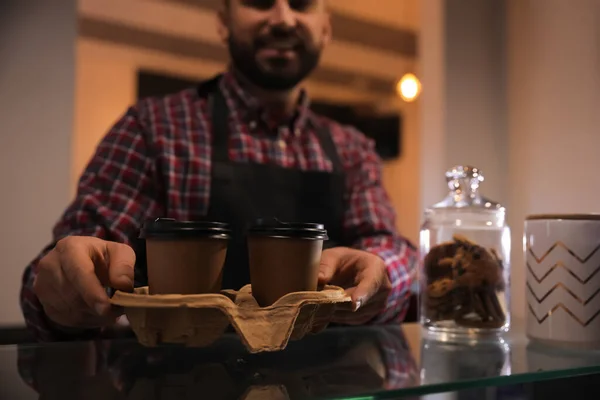 Barista Putting Takeaway Coffee Cups Cardboard Holder Glass Table Cafe — Φωτογραφία Αρχείου