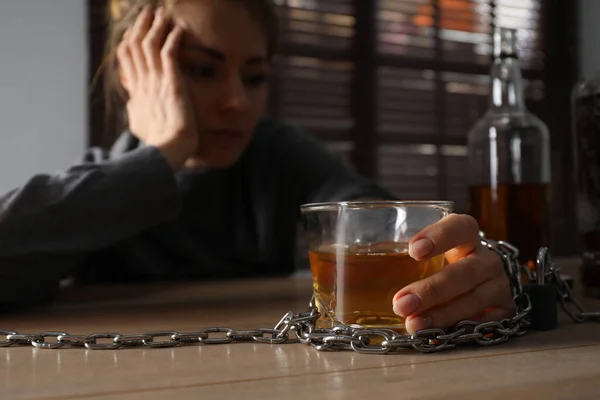 Alcohol Addiction Woman Chained Glass Liquor Wooden Table Room Focus — Stock Photo, Image