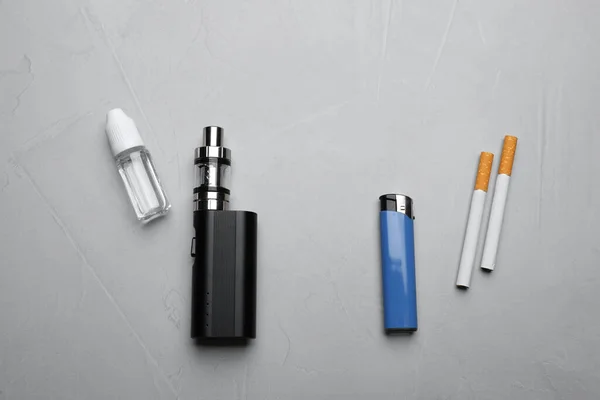Sigarette Con Accendino Vaporizzatore Fondo Grigio Piatta Fumatori Alternativi — Foto Stock