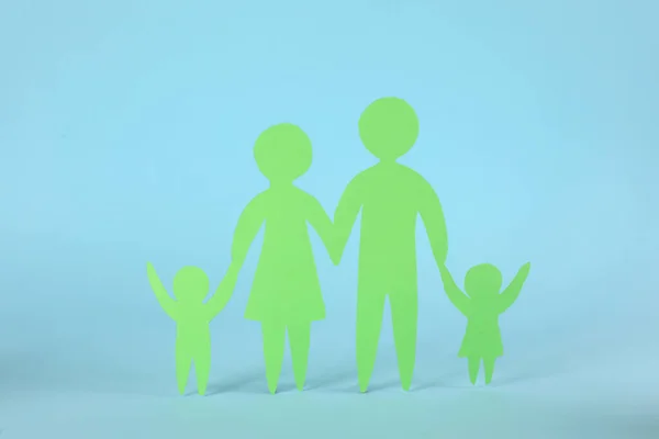 Paper Family Figure Light Blue Background Child Adoption Concept — Stock Photo, Image