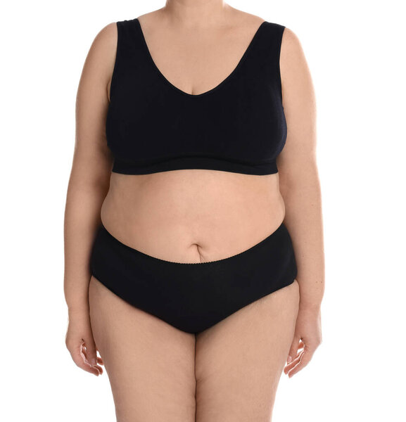 Overweight woman in underwear on white background, closeup