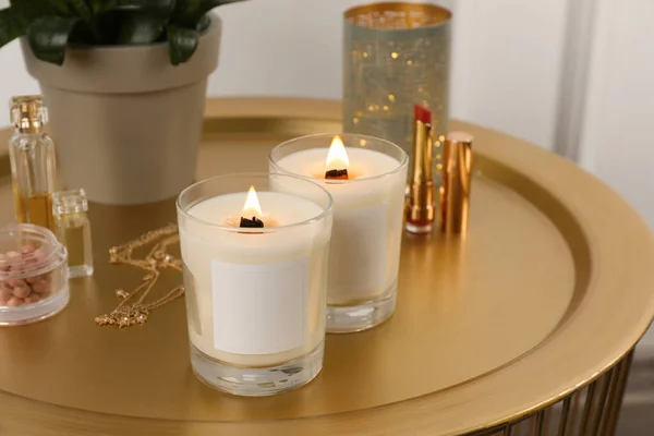 Burning Soy Candles Cosmetics Stylish Accessories Table Indoors — Stock Photo, Image