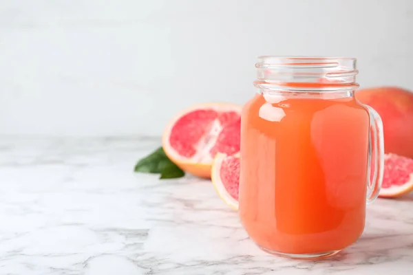 Tasty Freshly Made Grapefruit Juice White Marble Table Space Text — Stock Photo, Image