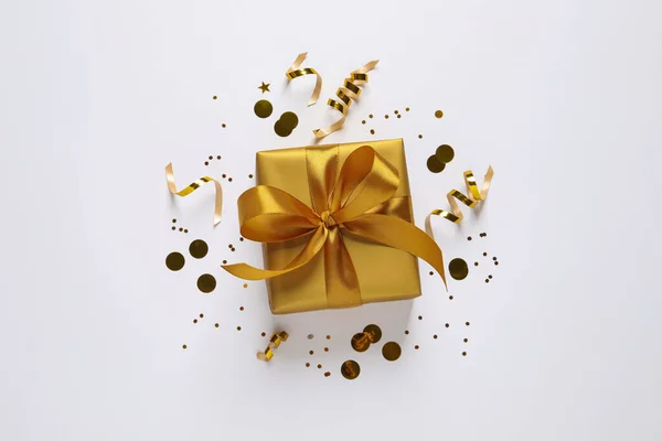 Beautiful Golden Gift Box Confetti White Background Flat Lay — Stock Photo, Image
