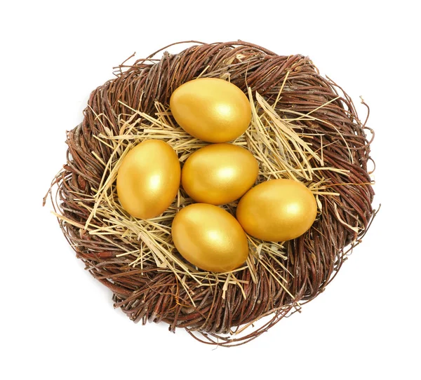 Glanzende Gouden Eieren Nest Witte Achtergrond Bovenaanzicht — Stockfoto