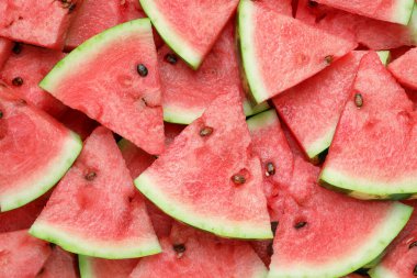 Arka plan olarak lezzetli olgun karpuz dilimleri, üst görünüm