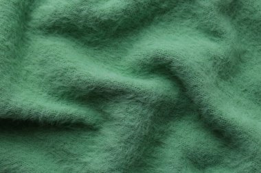 Arka plan olarak güzel yeşil kumaş, üst görünüm
