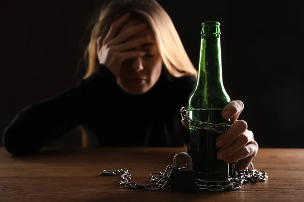 Alcohol Addiction Woman Chained Bottle Beer Wooden Table Black Background — Stock Photo, Image