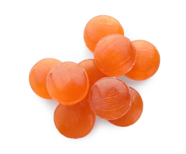 多くのオレンジ色の咳が白い背景に落ち トップビュー — ストック写真