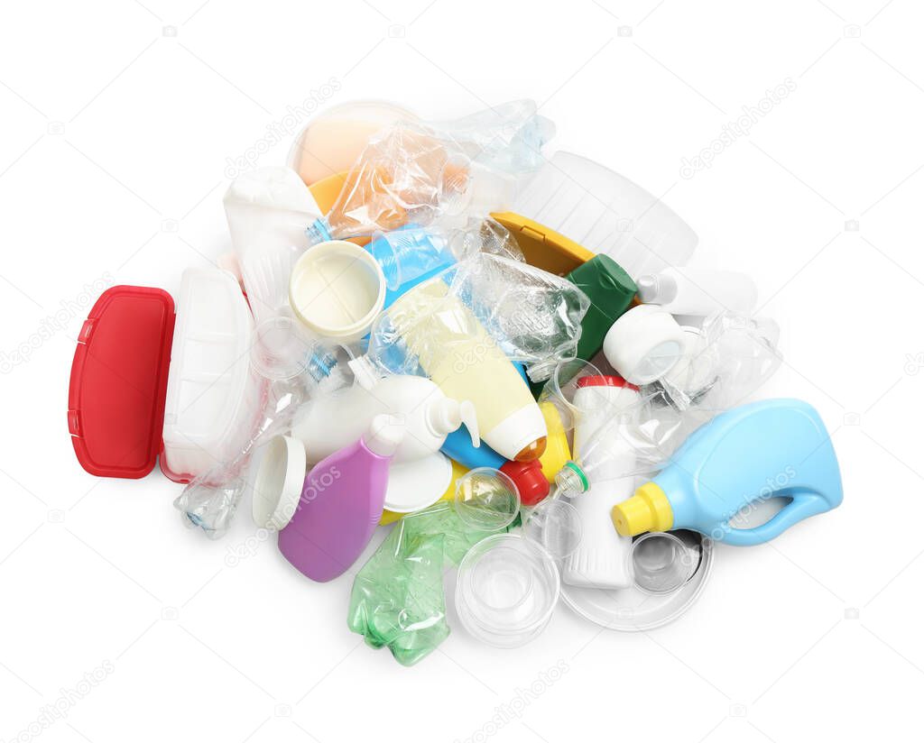 Pile of plastic garbage on white background, top view