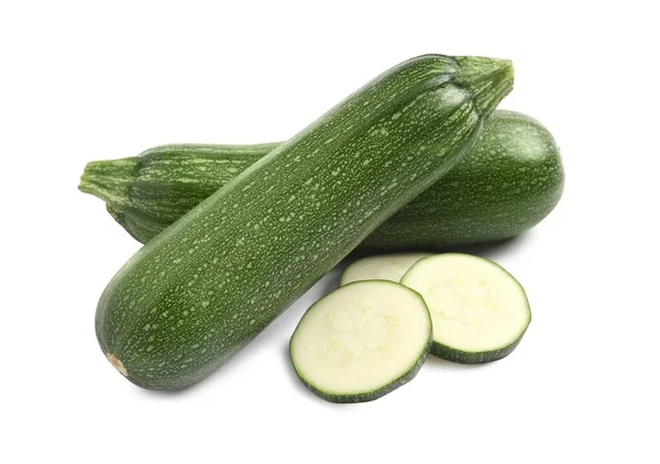 Ganze Und Geschnittene Reife Zucchinis Auf Weißem Hintergrund — Stockfoto