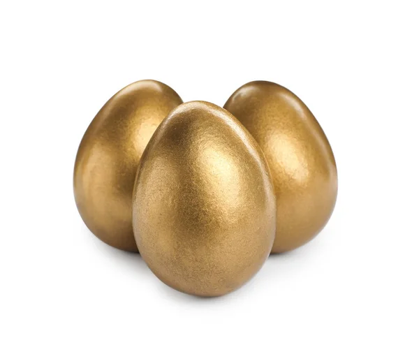 Mnoho Lesklých Zlatých Vajíček Bílém Pozadí — Stock fotografie