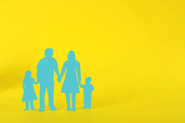 Paper Family Figure Yellow Background Space Text Child Adoption Concept — Stock Photo, Image