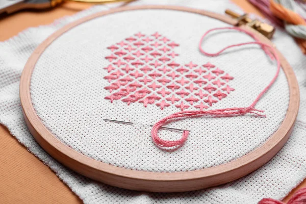 Canvas Embroidered Heart Needle Hoop Orange Background Closeup — Stock Photo, Image