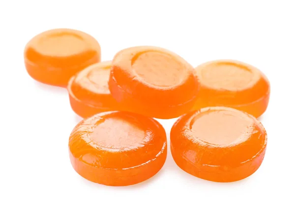 Много Апельсиновых Капель Кашля Белом Фоне — стоковое фото