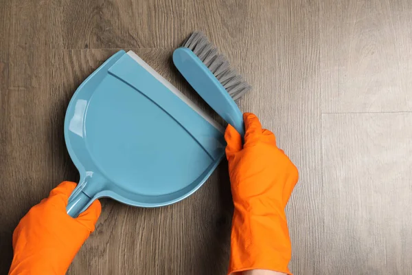 Woman Gloves Sweeping Wooden Floor Plastic Whisk Broom Dustpan Top — Stock Photo, Image