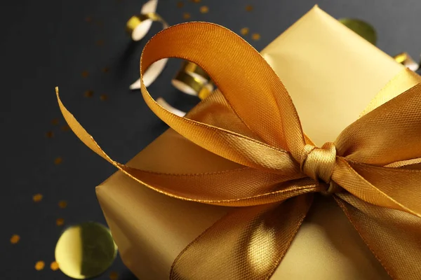 Golden Gift Box Bow Black Background Closeup — Stock Photo, Image